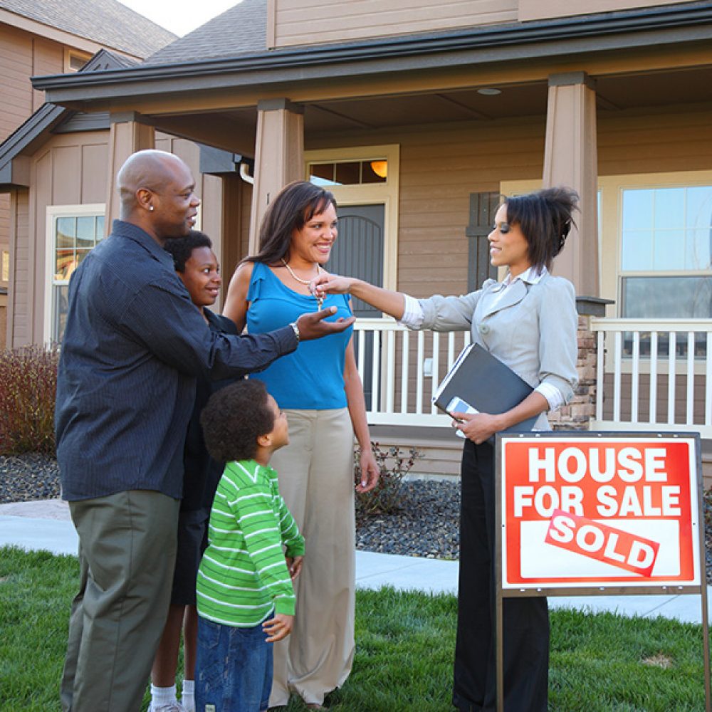 Realtor gives family keys to new home